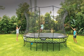 Black trampoline with a black safety net and yellow spring layer.